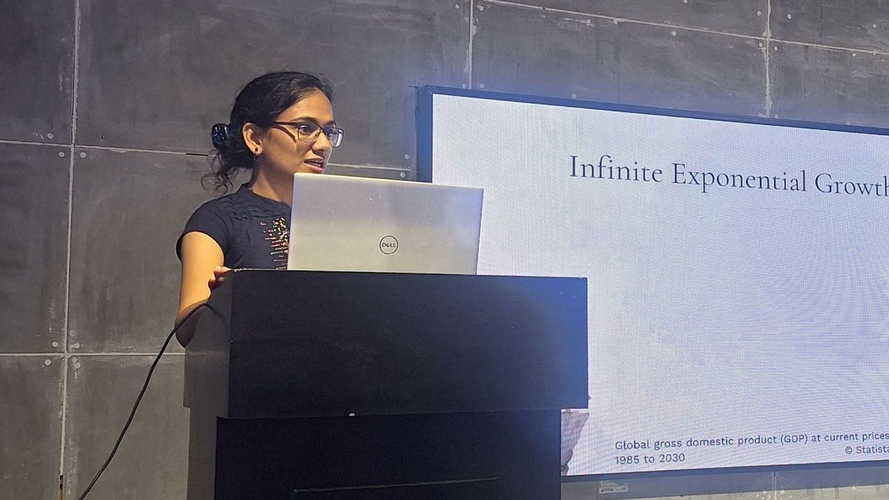Kanika Prajapat speaking at a conference