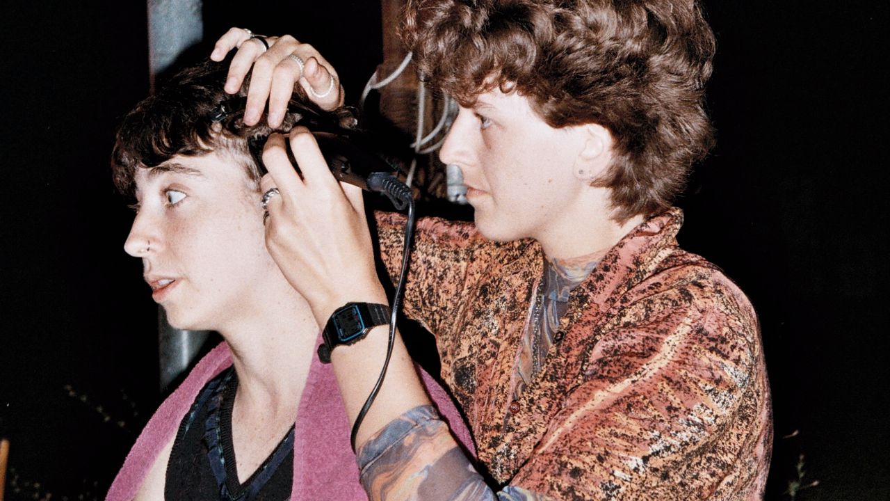 Person receiving a buzzcut