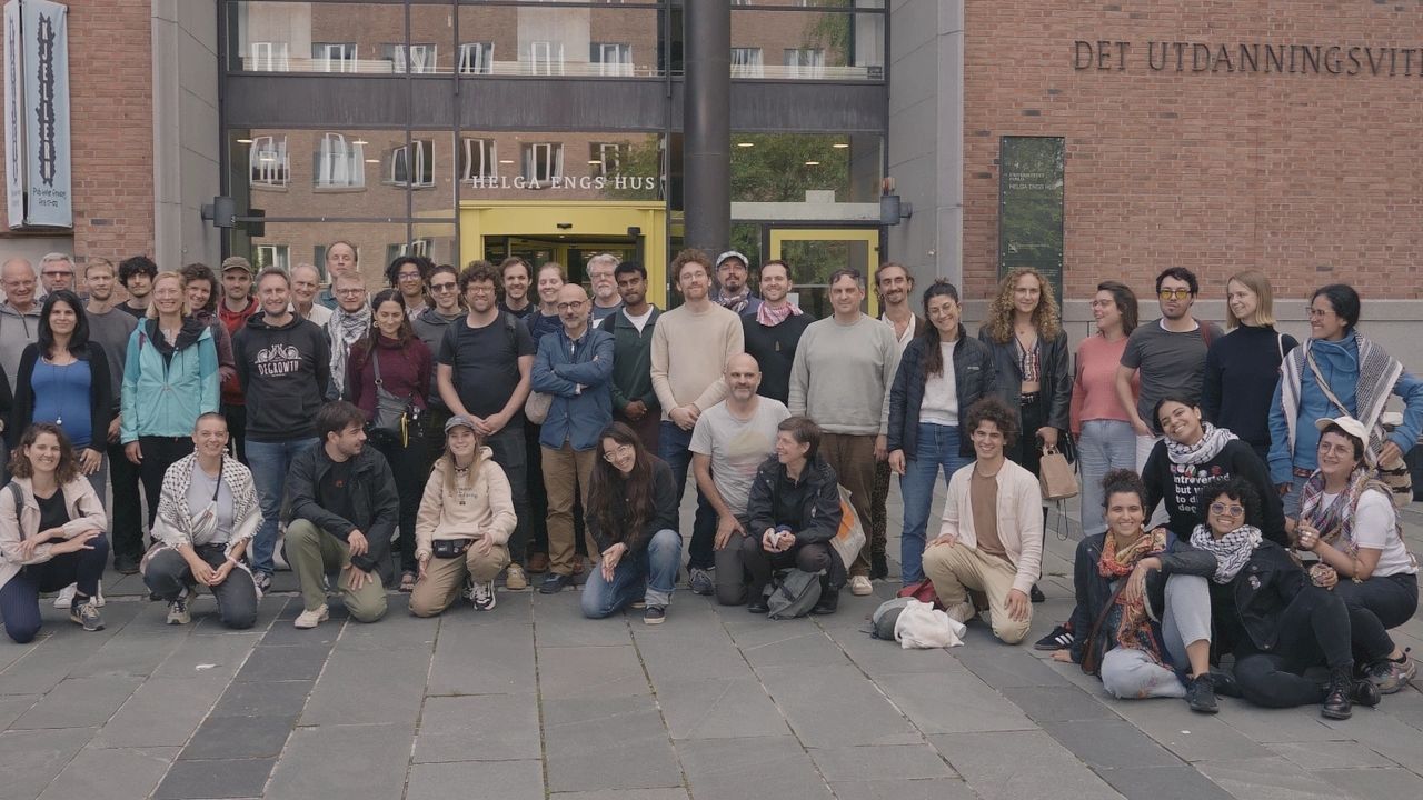 Members of the IDN outside Helga Engs Hus in Oslo, Norway