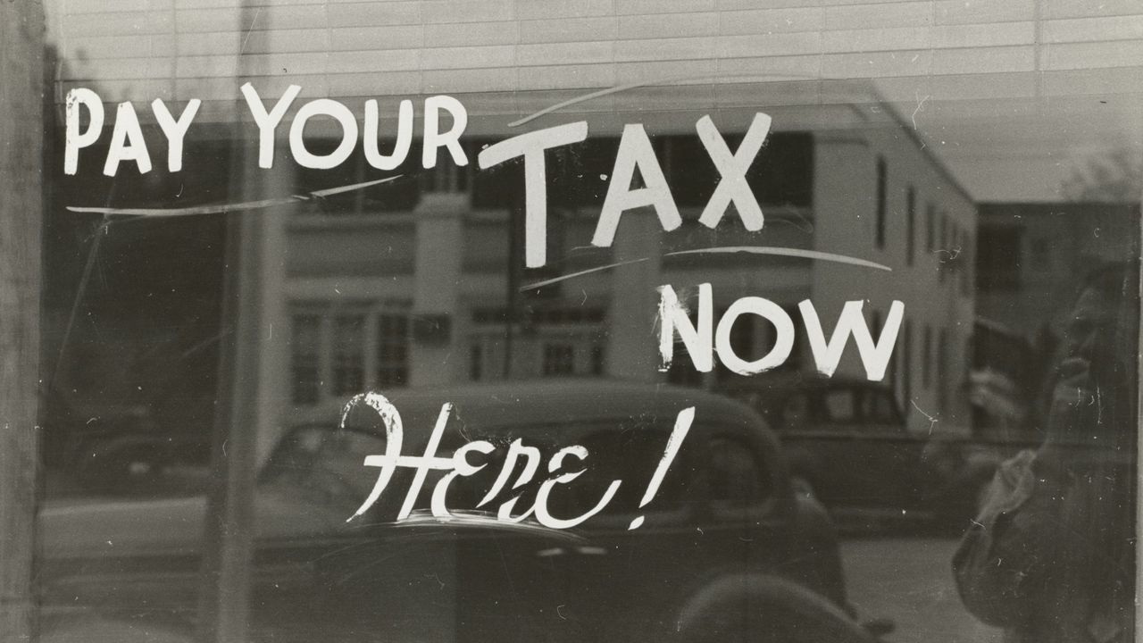Pay your Tax now here signage 