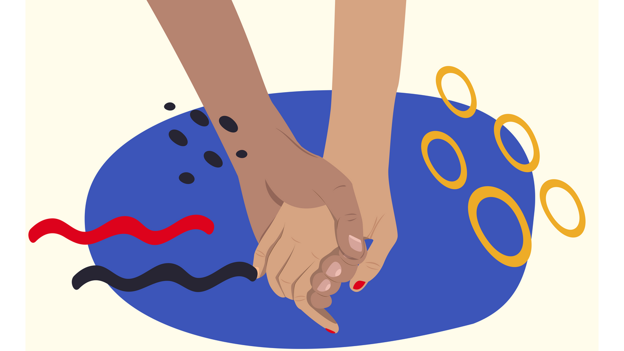 image de deux personnes se tenant la main