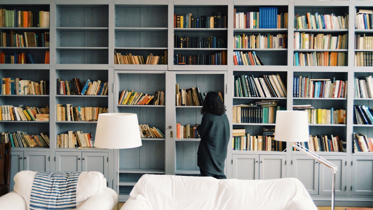 woman finding some book to read